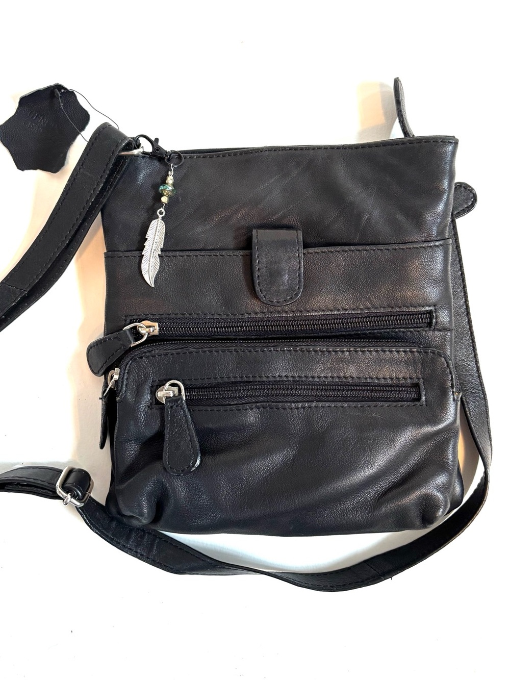Black Lightweight Leather Crossbody Bag with Silver Feather Charm